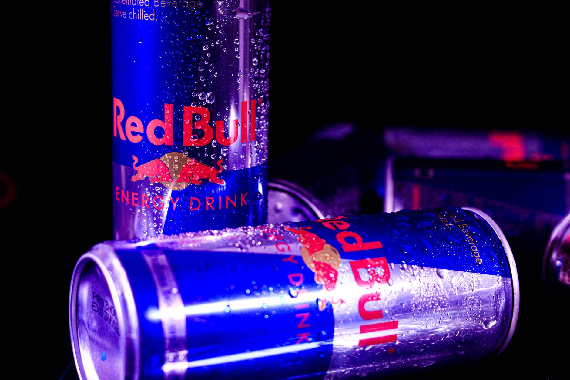 Energy drink can with red X overlay — visual avoid signal