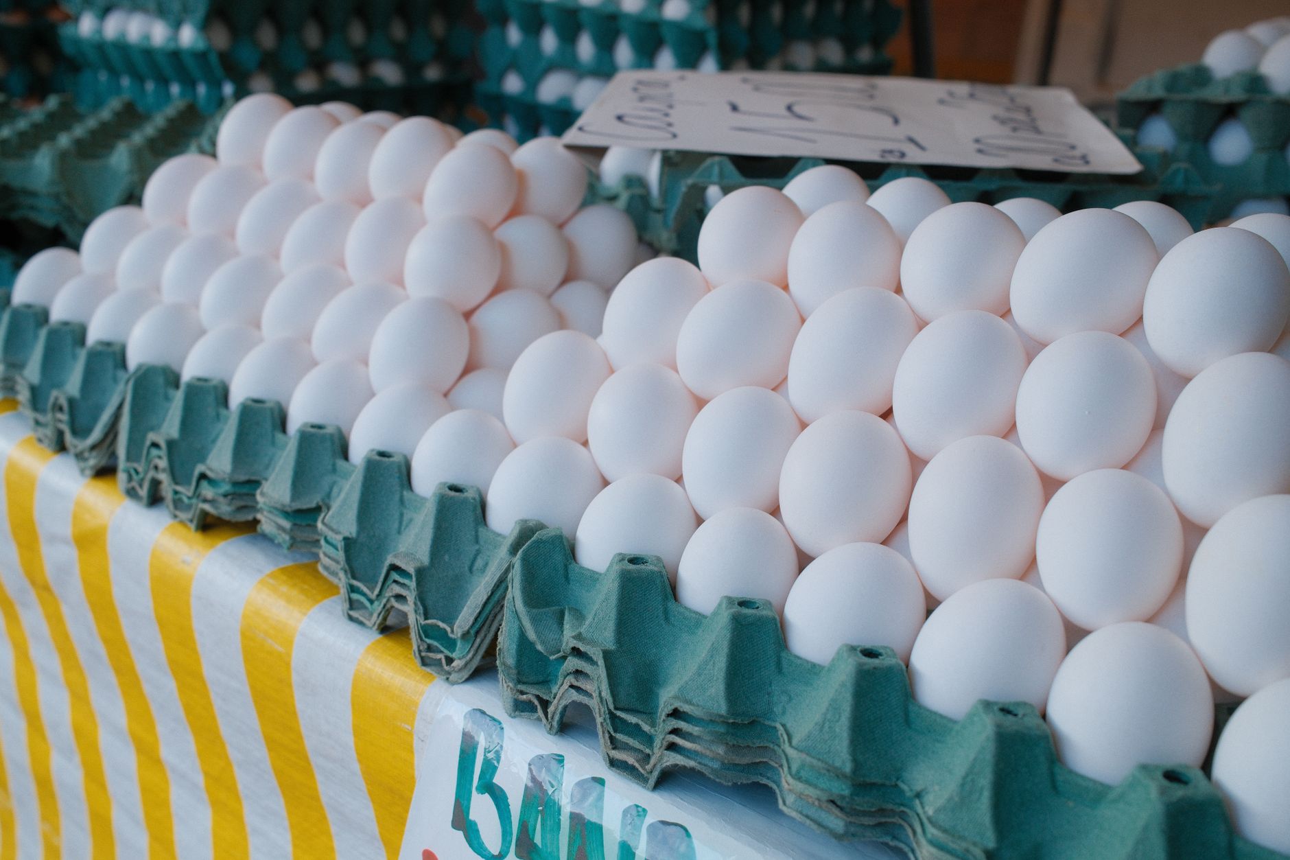 Eggs in carton with '150 mg choline per egg' callout overlay