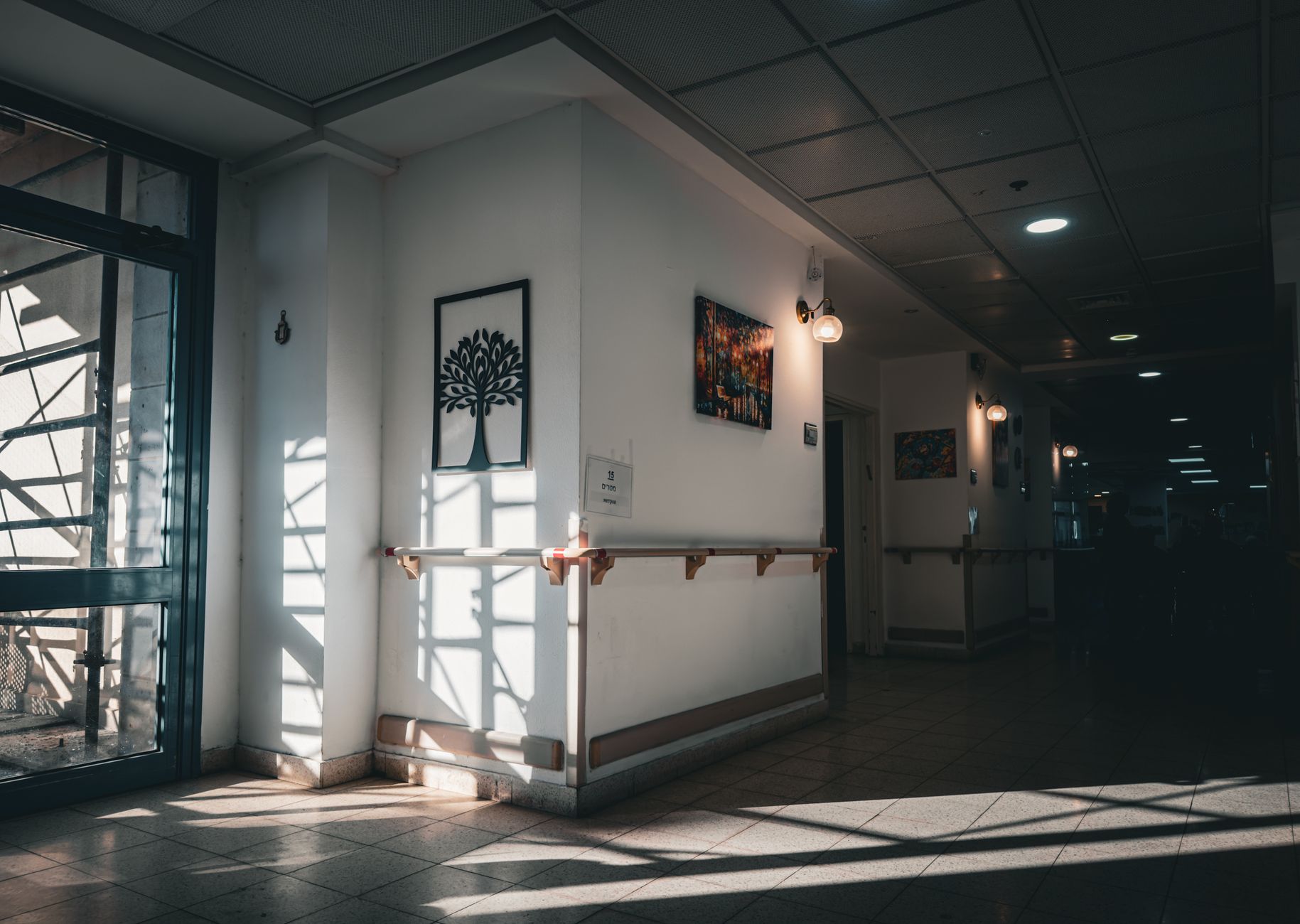 Calm hospital corridor with EPAU (Early Pregnancy Assessment Unit) signage